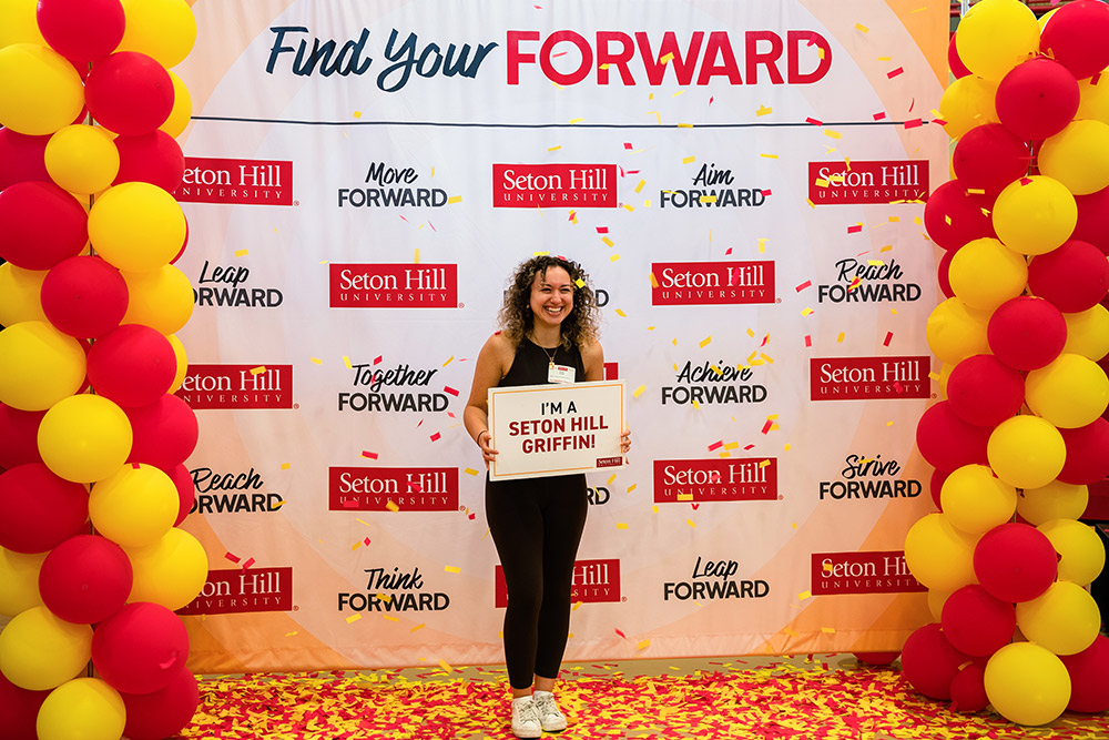 Young woman celebrating becoming a Seton Hill student